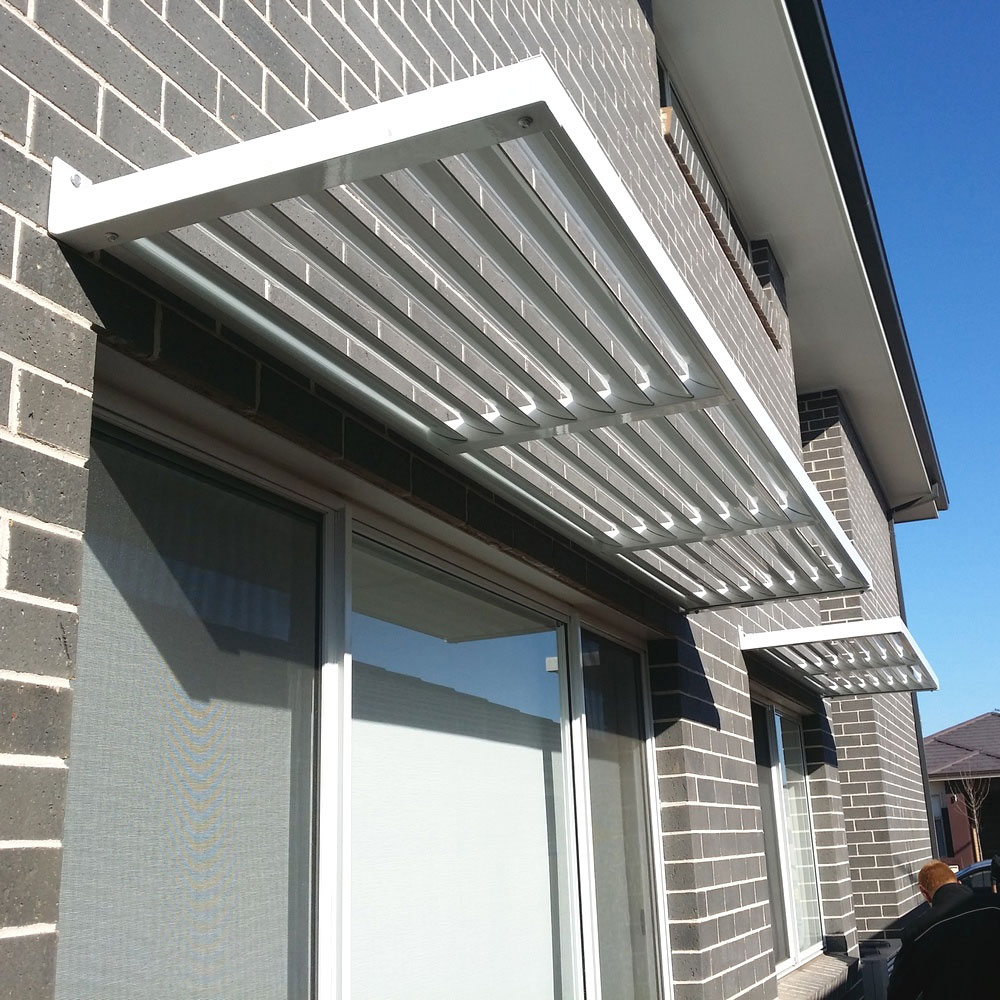 Aluminium cantilever louvres over sliding doors and windows, white powder coat, no front posts, Sydney home