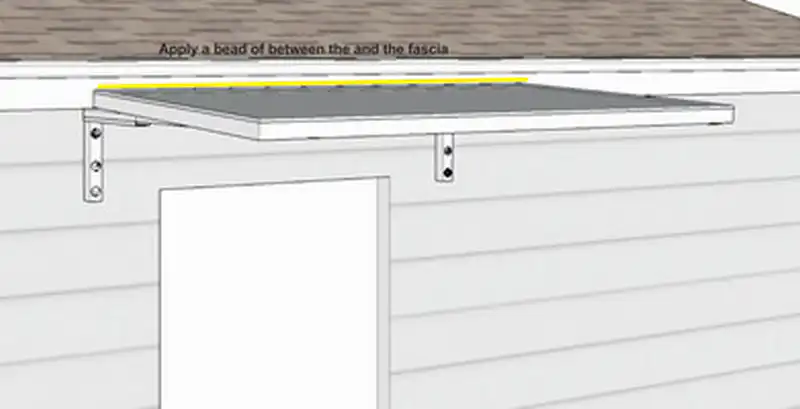 Applying silicone bead to seal Slimline 50 under eave awning Sydney against the fascia